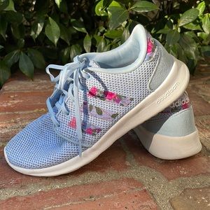 Nice blue adidas whit flowers stripes.